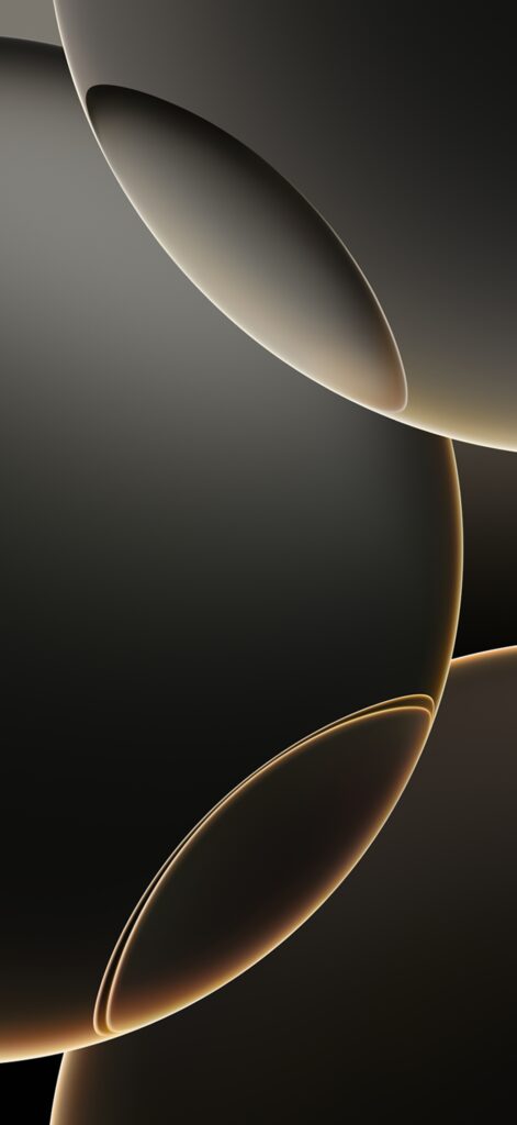 Abstract image featuring overlapping, softly lit, spherical shapes with dark gradient backgrounds. The spheres have a glossy appearance, creating a harmonious and modern design with subtle highlights.
