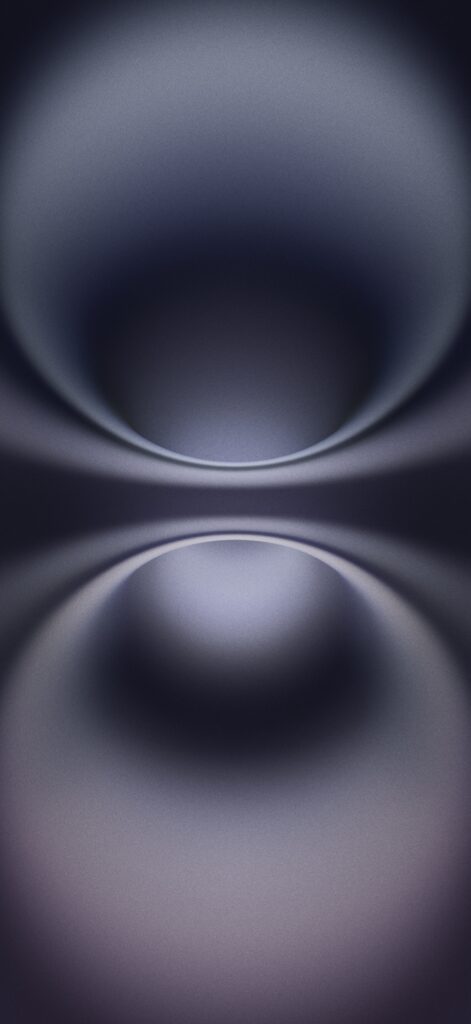 Abstract image with a gradient of soft, dark purple and gray tones. Curved lines create a symmetrical pattern that resembles two reflective, concentric circles fading into the background, producing a sense of depth and calm.
