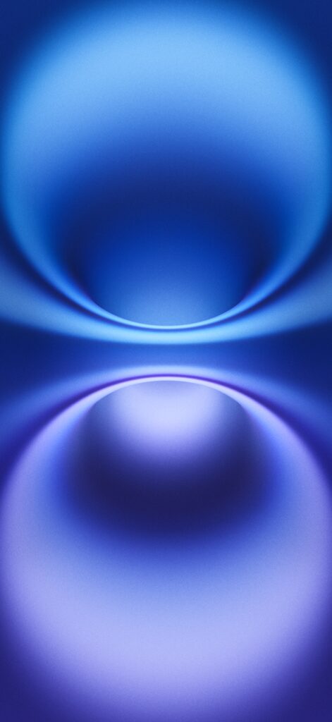 A mesmerizing abstract image featuring smooth gradients of blue and purple. The design forms two symmetric, curved shapes that create a sense of depth and motion, resembling waves or a fluid surface.
