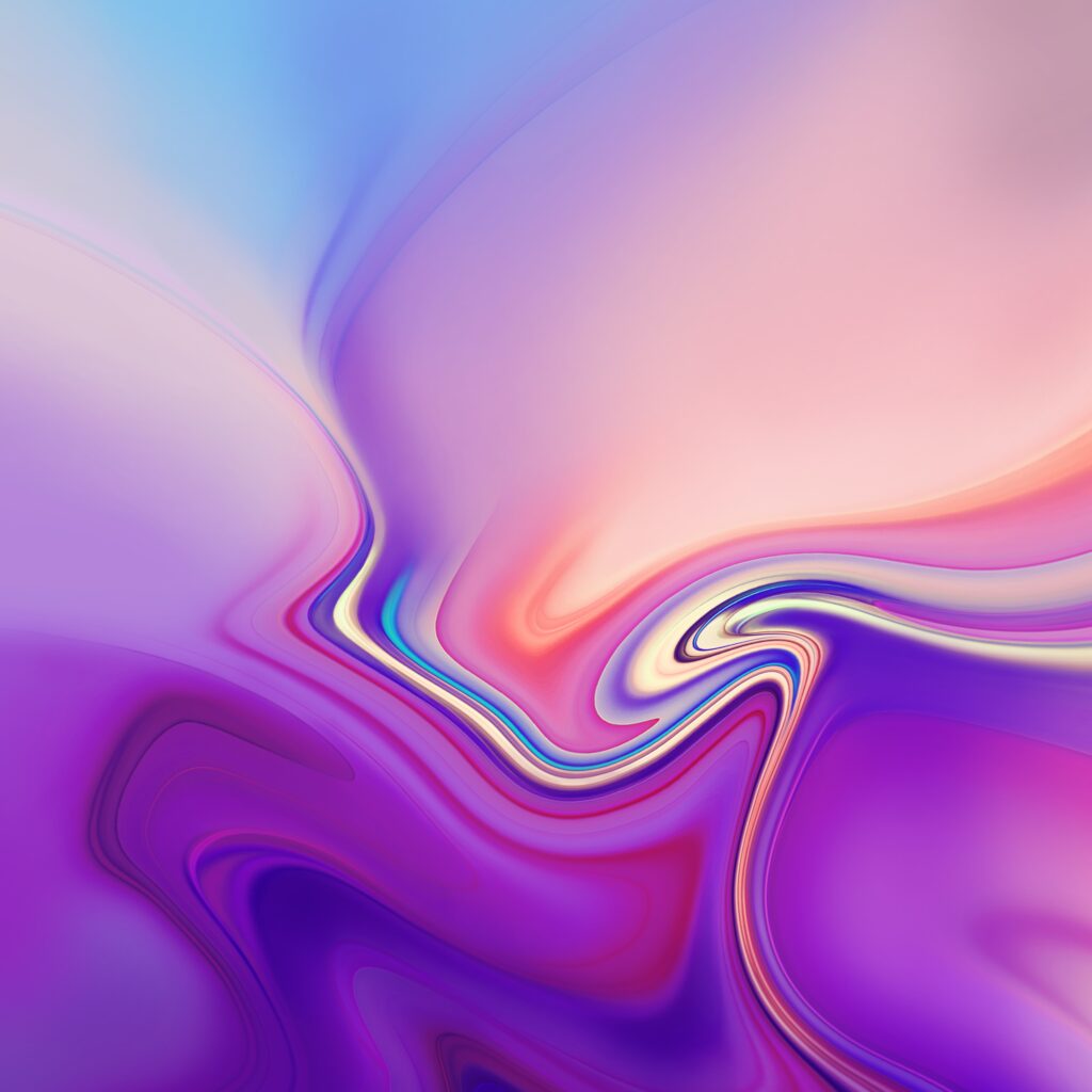 Abstract image with swirling colors blending from red at the top to dark blue and black at the bottom. Fluid lines and gradients create a dynamic, vibrant effect, reminiscent of liquid or smoke in motion.
