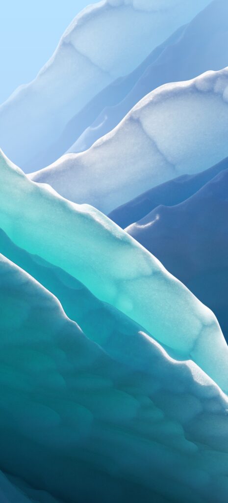 A close-up view of layered blue and turquoise ice formations, with smooth curves and varying shades, creating a serene and abstract natural pattern. Soft lighting highlights the gentle contours and translucency of the ice.
