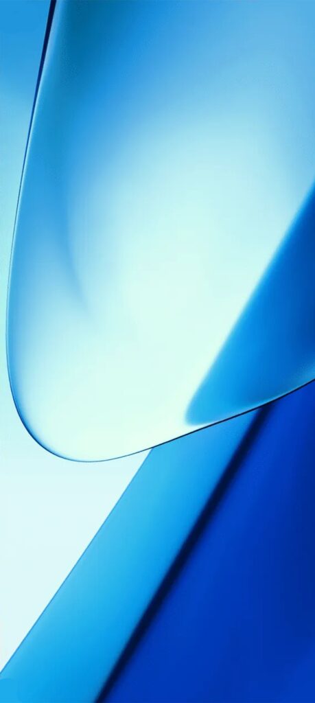 Abstract image featuring smooth, overlapping translucent blue shapes on a gradient light blue background, creating a sense of depth and fluidity.
