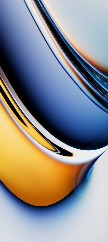 Close-up of abstract swirls with a smooth gradient of blue, orange, and white colors. The flowing lines and curves create a dynamic and fluid composition, reminiscent of liquid or glass.
